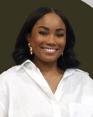 Photo of Dr. Dominique Thomas, Licensed Professional Counselor, LPC, PSC