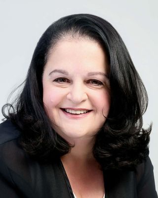 Photo of Maria T Malchiondo, Counsellor, BSc, MHSc, MEd