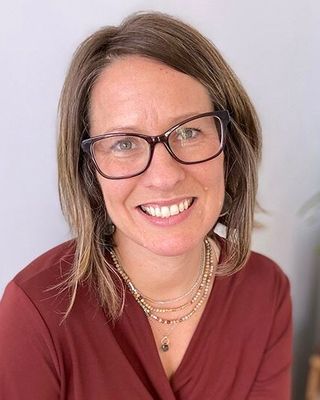 Photo of Kerry Puniello, Counselor, LMHC-A, CCEP, CPCC, RYT500