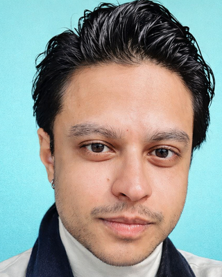 Photo of Taha Hareb, Licensed Mental Health Counselor, LMHC