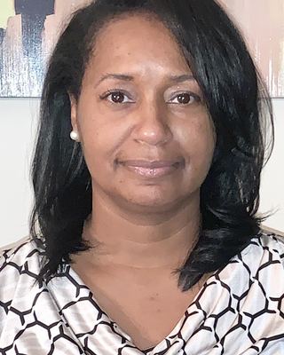 Photo of Kwanika Pomales, Psychologist, LPC