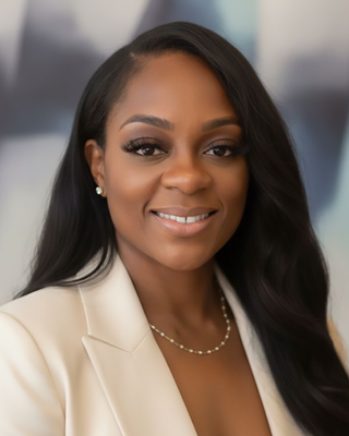 Photo of Medjinn Thomas, Psychiatric Nurse Practitioner, PMHNP