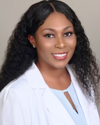 Photo of Love Bamisile, Psychiatric Nurse Practitioner, PMHNP