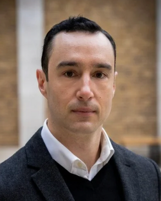 Photo of Luke Manzarpour, Psychotherapist, MA, UKCP Trainee