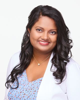 Photo of Claudia Louis, Registered Psychotherapist (Qualifying), MACP, HBA