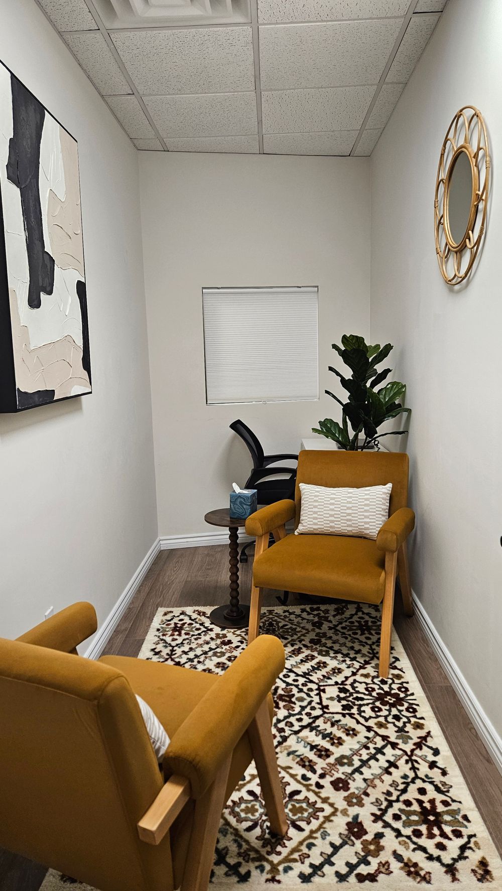 Join me at the cozy chair in the coziest office in Astoria