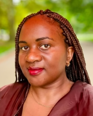 Photo of Brenda Kobusingye, Psychiatric Nurse Practitioner, PMHNP