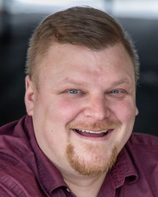 Photo of Blaine O'Tolls, Counselor, LCPC