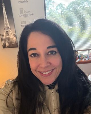 Photo of Dr. Anamaria Ryan, Counselor, PhD, MA, LMHC, CAP