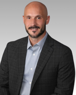 Photo of Dustin Husemann, Psychiatric Nurse Practitioner, MSN, ACNP-BC, PMHNPBC