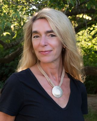 Photo of Jacqueline Dimick, Licensed Clinical Professional Counselor, LCPC, MEd, PCC, CYT, CHT