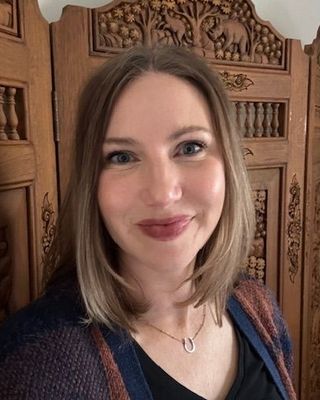 Photo of Kassie McCune, Licensed Mental Health Counselor, MA, LMHC, LPC, CMHC, QS