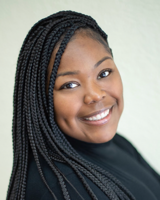 Photo of Brittany Quinn - Brittany Quinn - NOCD, Counselor, LMHC, MS