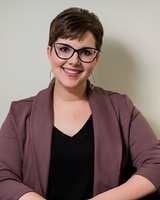 Gallery Photo of Megan Neitling [pronounced: NYT-ling] is a Licensed Mental Health Counselor, an AASECT Certified Sex Therapist, and a Sexualities Educator.