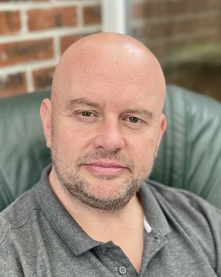 Photo of Kris Daniel, Psychotherapist