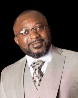 Photo of Dr. Ernest Takang, Psychiatric Nurse Practitioner, PMHNP