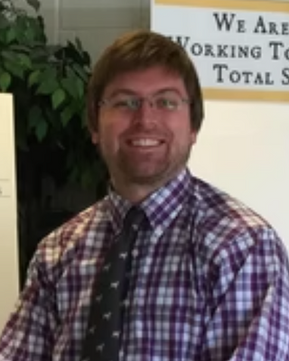 Photo of Christopher Maclean-Everhart, Licensed Clinical Mental Health Counselor, LCMHC