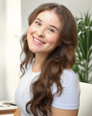 Photo of Janna Noto-Campanella, Registered Psychotherapist (Qualifying), HBA, MACP, CAIP