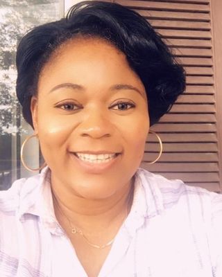 Photo of Esther Ola, Psychiatric Nurse Practitioner