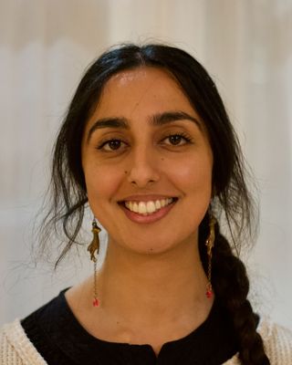 Photo of Maela Amin, Psychotherapist, MA, HCPC-Art Therap.