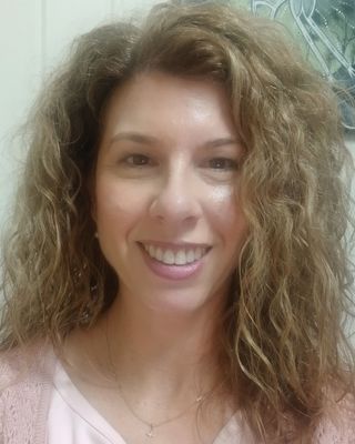 Photo of Lucia Atta, Social Worker, AMHSW