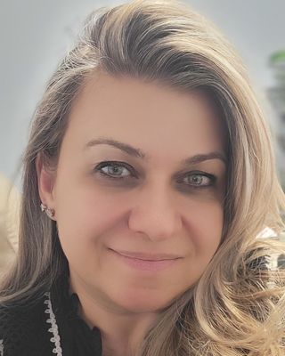 Photo of Nejla Sezer, Counselor, LMHC