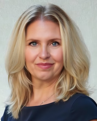 Photo of Denayer Mueller, Psychiatric Nurse Practitioner, PMHNP