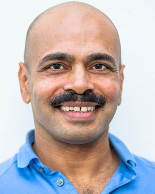 Photo of Tj (Tejinderpal) Rai, MD, Psychiatrist