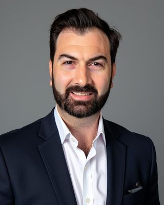 Photo of Alex Cojanu, Psychiatrist, MD, MS