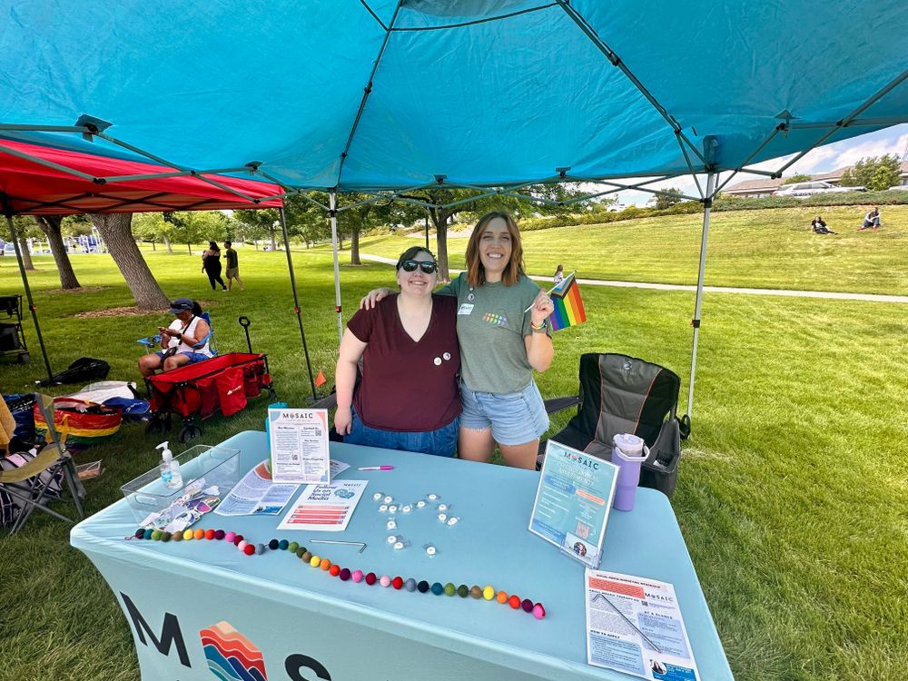 Dr. Muñoz and Dr. Powers tabling at Broomfield Pride 2025!