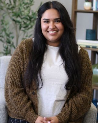 Photo of Kenia Bustos, Marriage & Family Therapist, MA