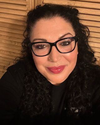 Photo of Elif Angel Raynor, Licensed Mental Health Counselor, LMHC, CCH, QS, CSTIP