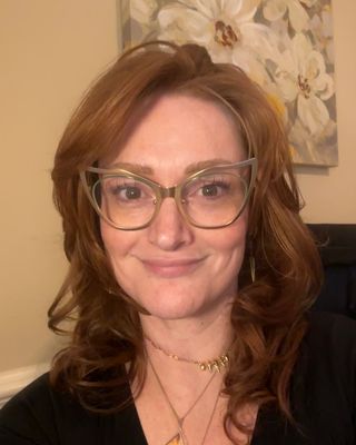 Photo of Holly Floyd, Marriage & Family Therapist, LMFT, CCTP, CGIP, TCTSY-F, RYT500