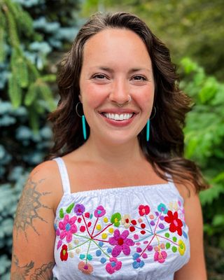 Photo of Emma Jean McEvilly, Licensed Mental Health Counselor, MSEd, Coach, CYT1000