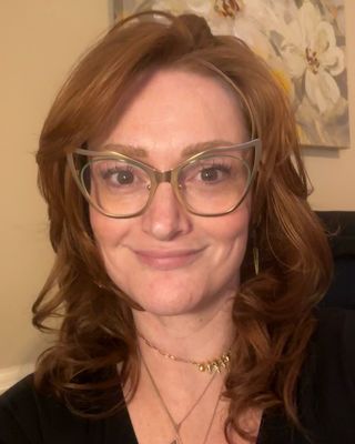 Photo of Holly Floyd, Marriage & Family Therapist, LMFT, CCTP, TCTSY-F, RYT 500, RCYT