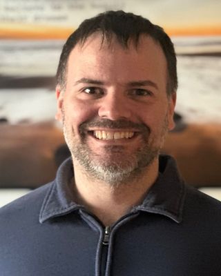 Photo of Michael J Curtis, LMSW