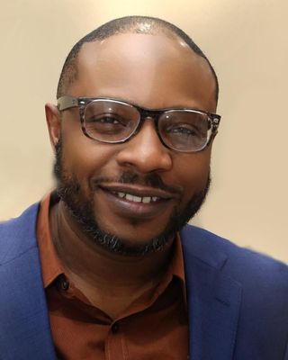 Photo of Mustapha Olugbile, Psychiatric Nurse Practitioner, DNP, APRN, PMHNP