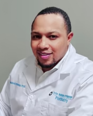 Photo of John Muthiga, Psychiatric Nurse Practitioner, PMHNP