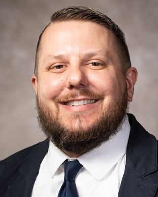 Photo of Dr. Tj Schoonover, Counselor, PhD, LCPC, RPT