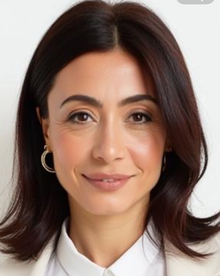 Photo of Secil Usta, Psychotherapist, MA, MBACP
