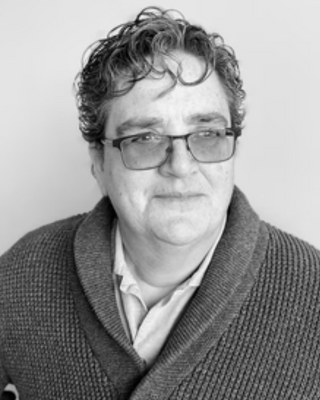 Photo of Mendel Mok, Counselor, LMHC