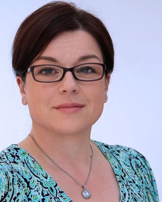 Photo of Julia Klara Condrea, Registered Social Worker, MSW, RSW, CCTP, ADHD-, CCSP