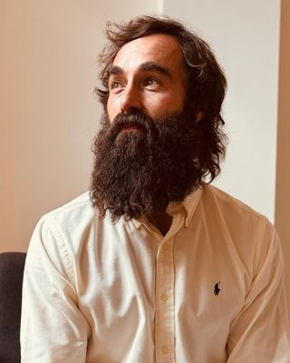 Photo of Dustin Fruson, Pre-Licensed Professional, BComm, MEd, RYT 500