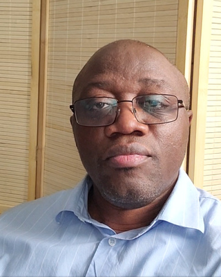 Photo of Macdonald Doh Ndibmun, Registered Psychotherapist (Qualifying), MACP, RN, Pst