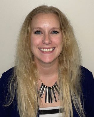 Photo of Siobhon Leuschner, BS, MS, LMHC, QS, Licensed Professional Counselor