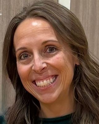 Photo of Dr. Cami Lerminez, Counselor, PsyD, LCPC, LMHC