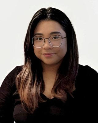 Photo of Justine Biado, Registered Psychotherapist, MACP