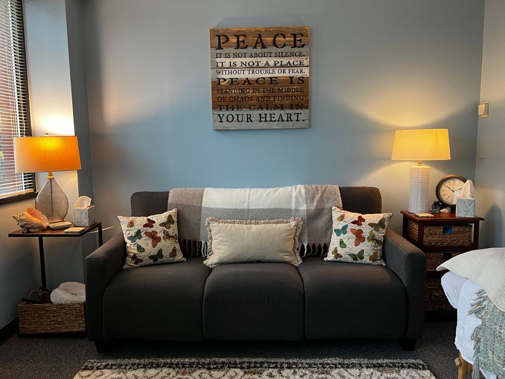 My office space is warm and inviting with space for somatic-based psychotherapy practices. It is located in a handicap-accessible office building.