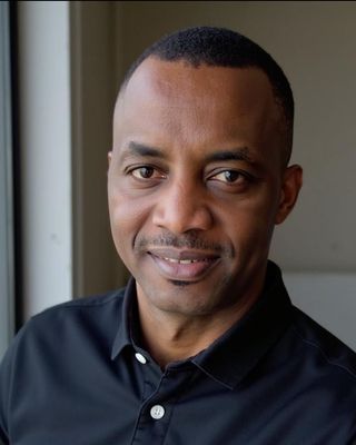 Photo of Berry D Nibogora, Registered Psychotherapist, LLM, RP