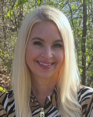 Photo of Julie Russell, Licensed Clinical Mental Health Counselor, LCMHC, MA
